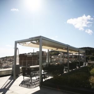 Customized pergola in the chill out atmosphere of the terrace